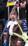 Young girl in mariachi suit