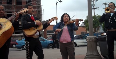 image of Mariachi band rehearsing in Mariachi Plaza in Boyle Heights, Los Angeles, CA.