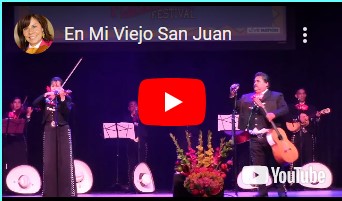 image of Mariachi Tesoro de Rebecca G. on stage playing "En Mi Viejo San Juan"
